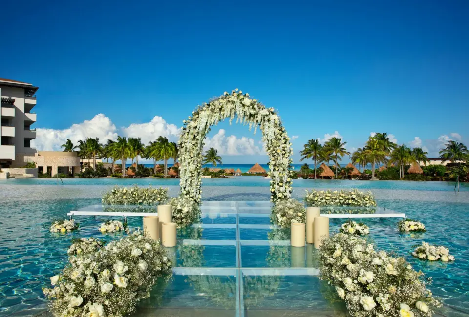Weddings altar pool at Dreams Playa Mujeres golf and spa
