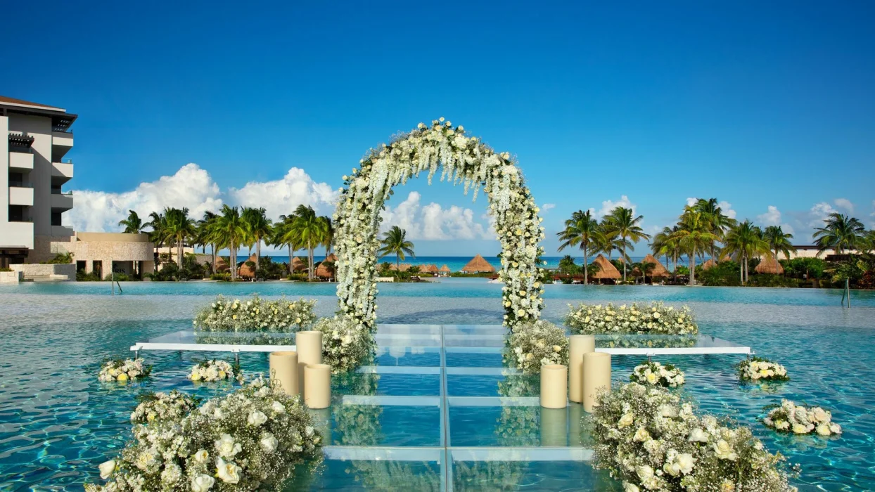 Weddings altar pool at Dreams Playa Mujeres golf and spa