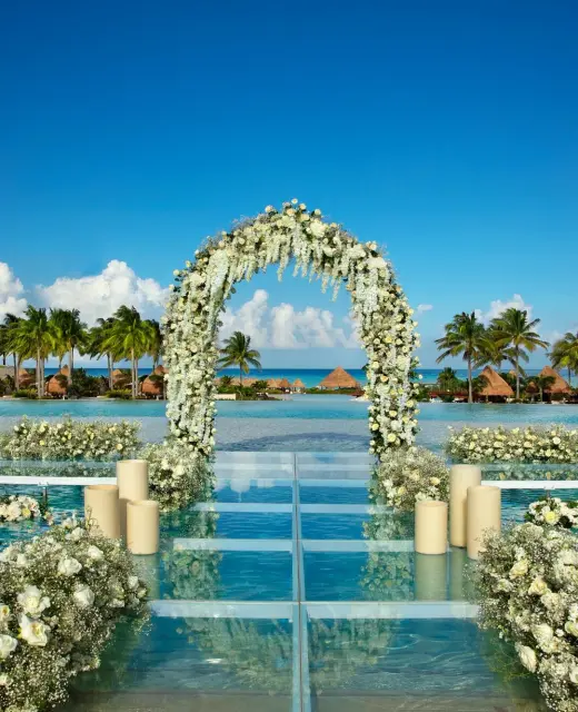 Weddings altar pool at Dreams Playa Mujeres golf and spa