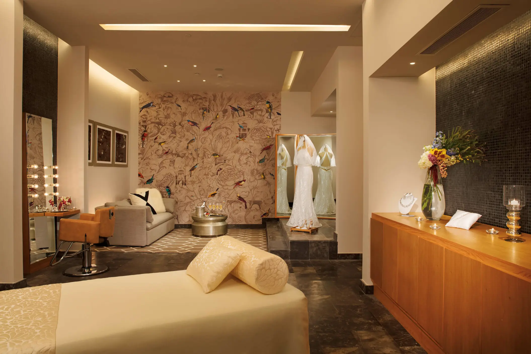 Bridal suite with wedding dress and vanity at Dreams Playa Mujeres, Cancun
