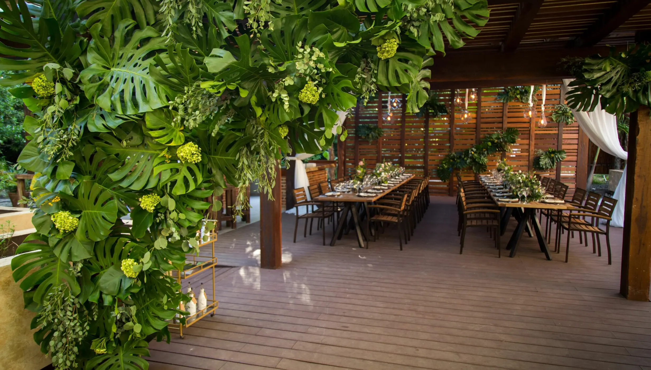 Chef’s Garden wedding reception setup with tropical greenery at Dreams Riviera Cancun, Riviera Maya