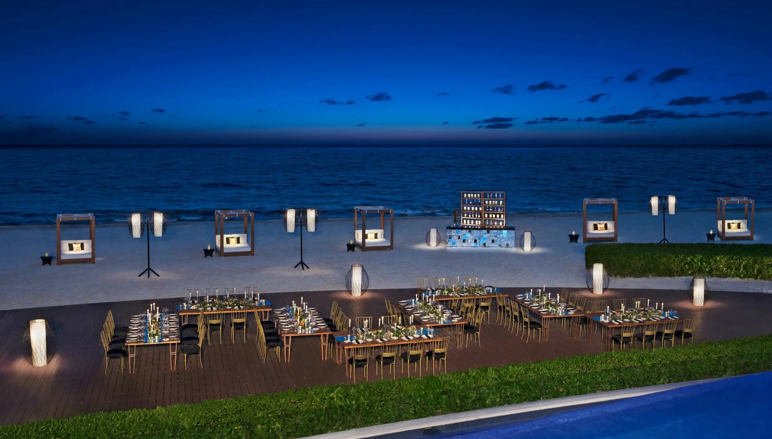 Outdoor wedding reception dinner on the deck at Dreams Riviera Cancun, Riviera Maya