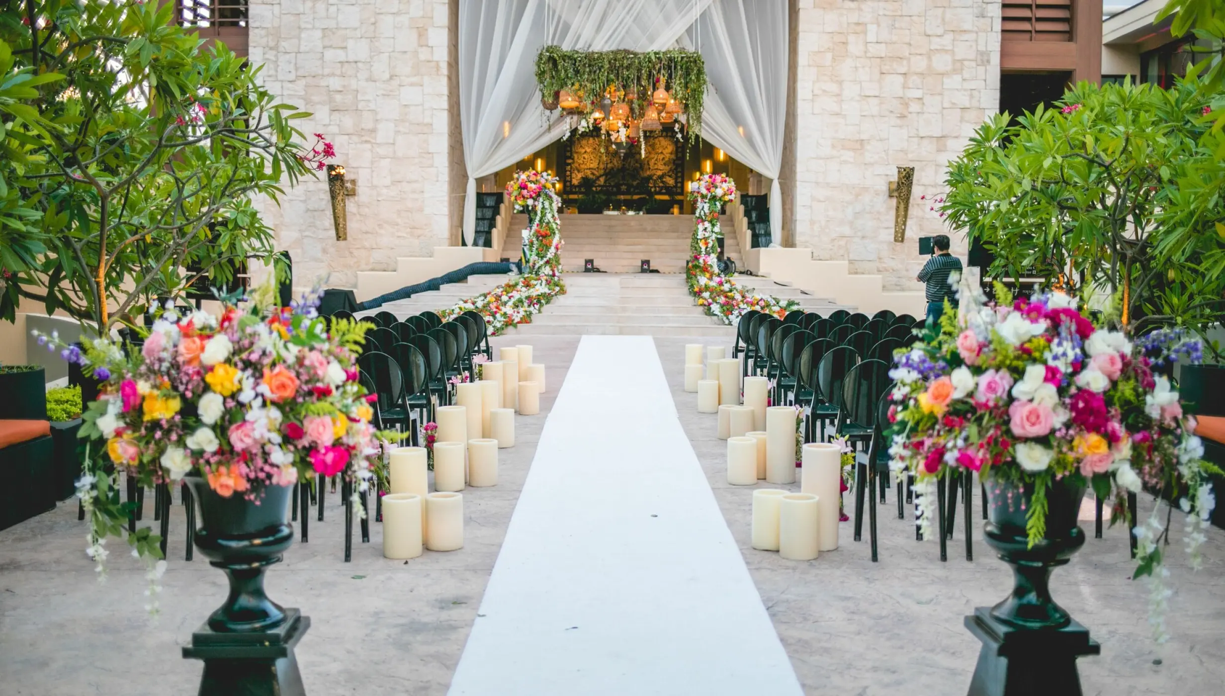 Grand lobby staircase wedding ceremony at Dreams Riviera Cancun, Riviera Maya