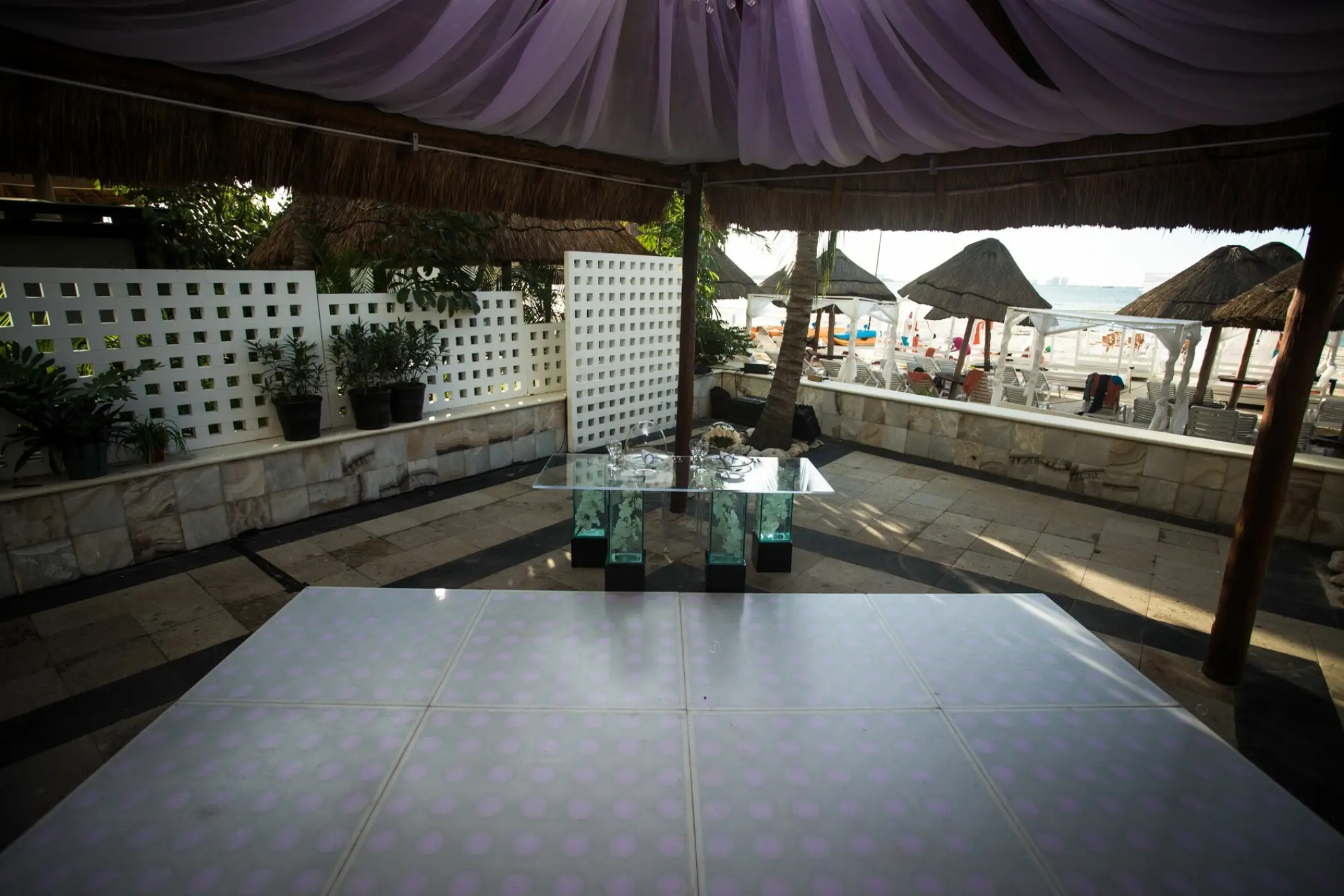 Desire Terrace outdoor wedding reception setup with dance floor at Dreams Sands, Cancun