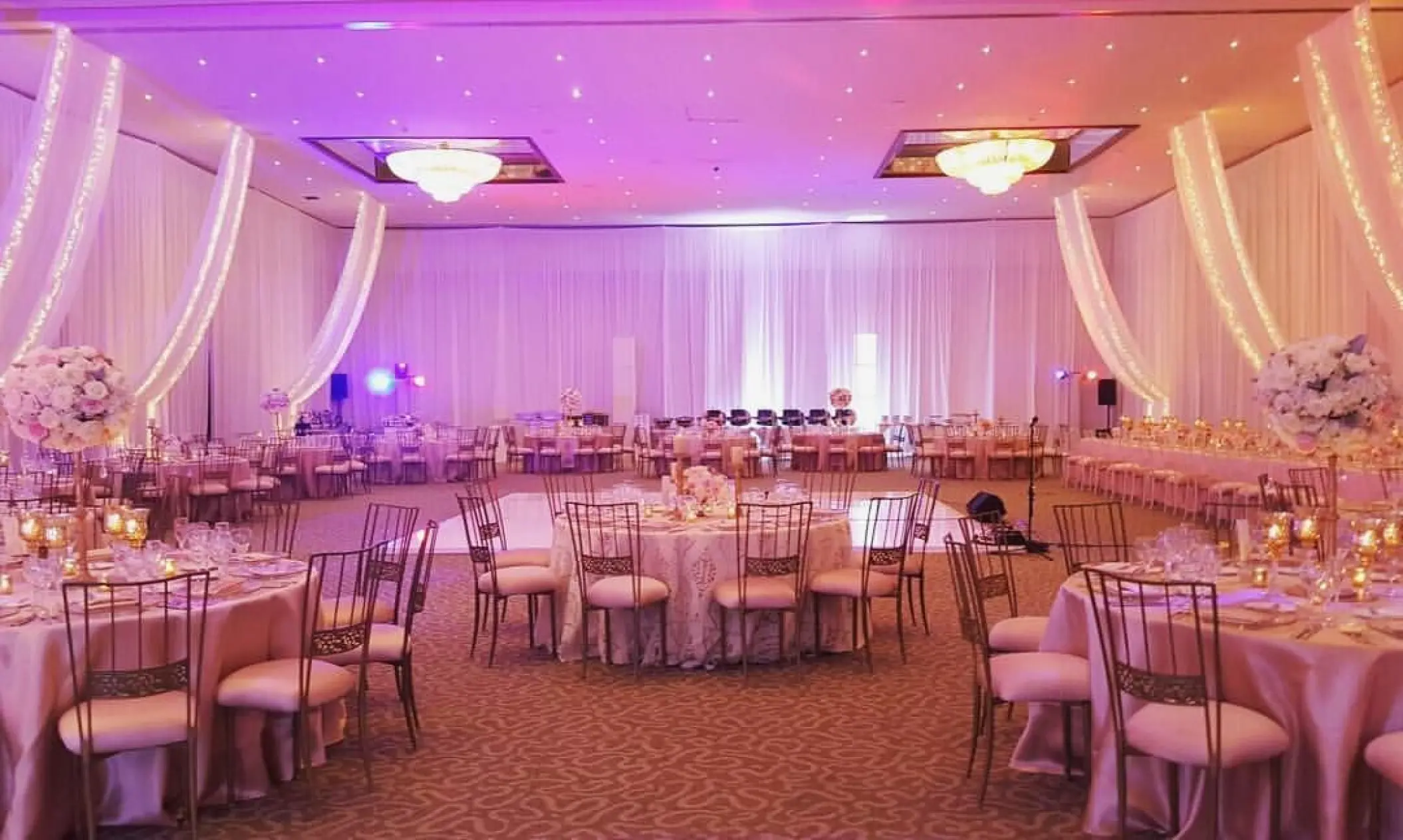 Indoor wedding reception in the ballroom at Dreams Sapphire, Riviera Maya