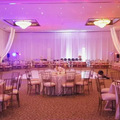 Indoor wedding reception in the ballroom at Dreams Sapphire, Riviera Maya