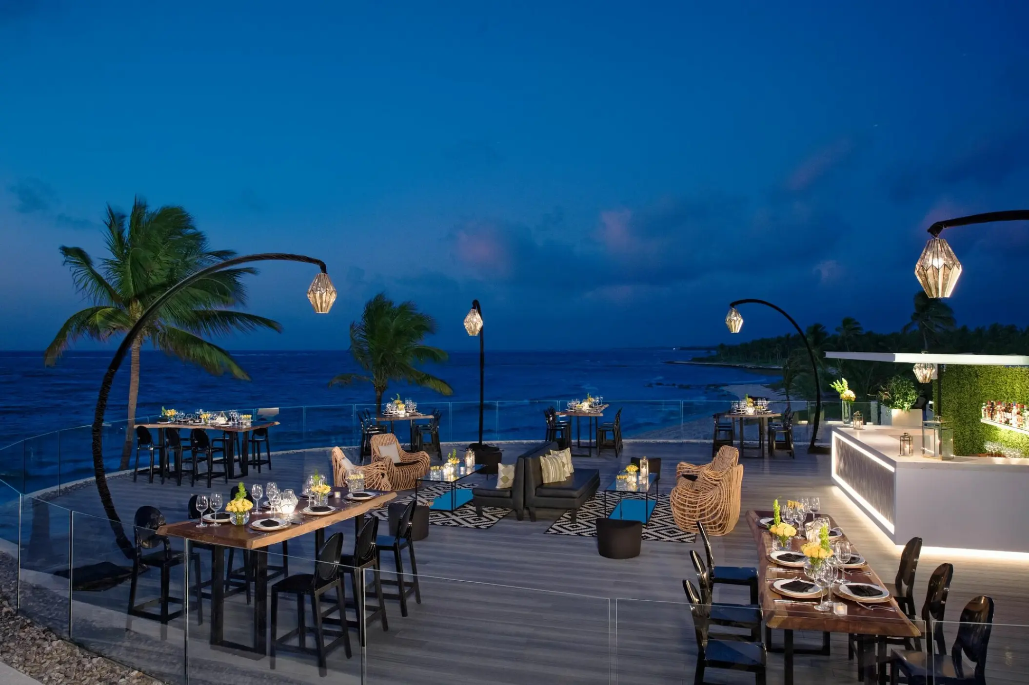 Rooftop terrace wedding reception with ocean views at Dreams Tulum, Tulum