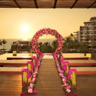 Floral circle arch for a wedding ceremony at Dreams Vallarta Bay, Puerto Vallarta