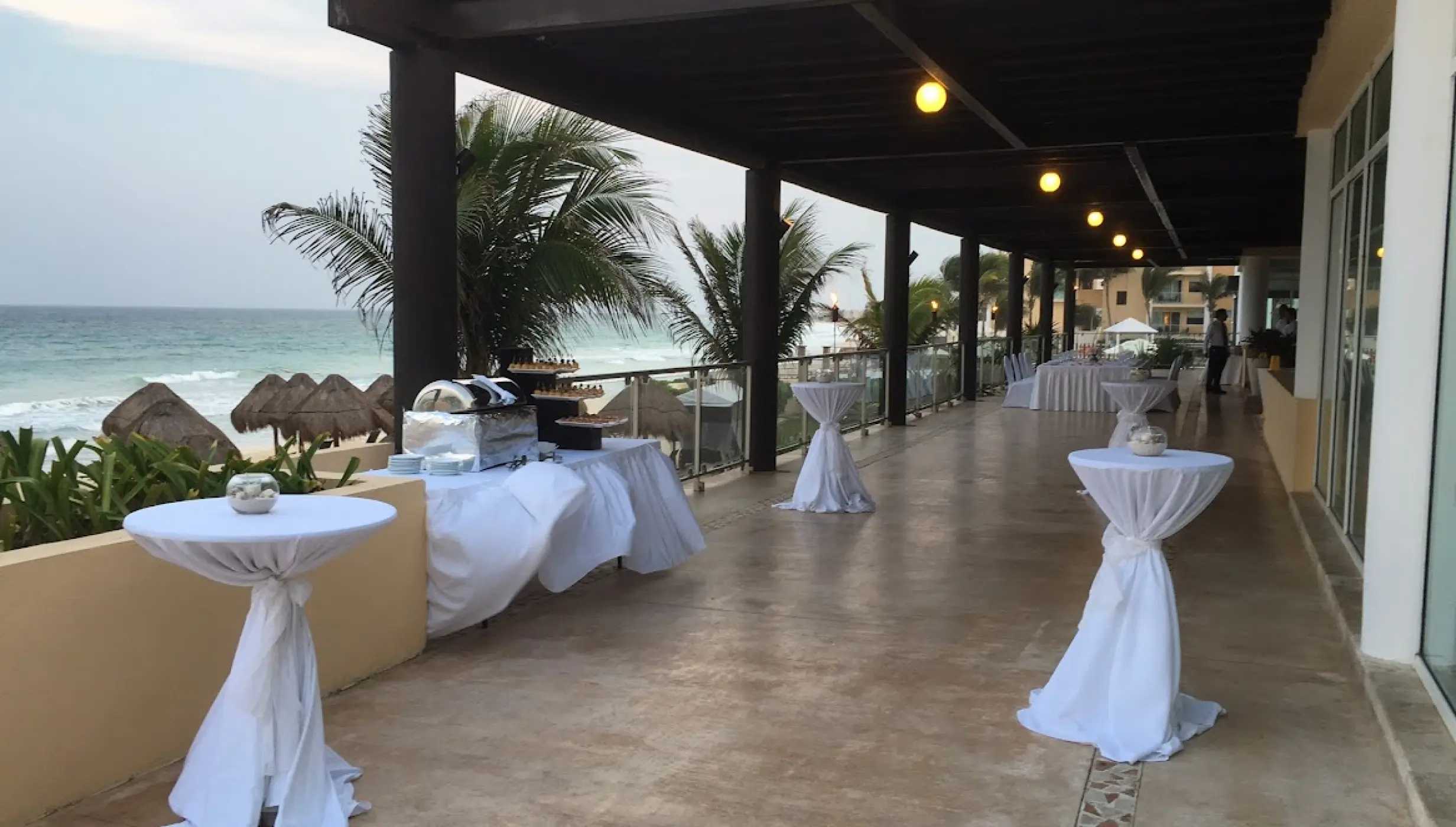 Cocktail reception on the oceanfront Carnival Terrace at Dreams Jade, Riviera Maya