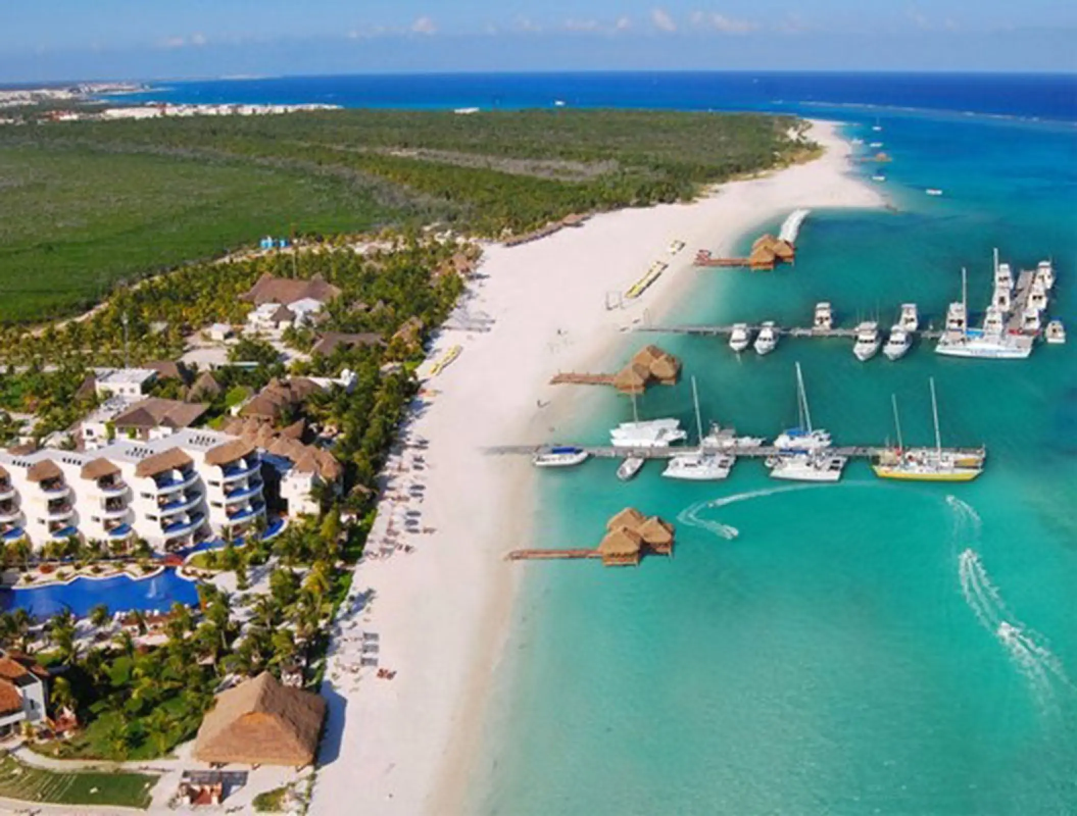 Aerial view of El Dorado Maroma beach and boat docks, Riviera Maya