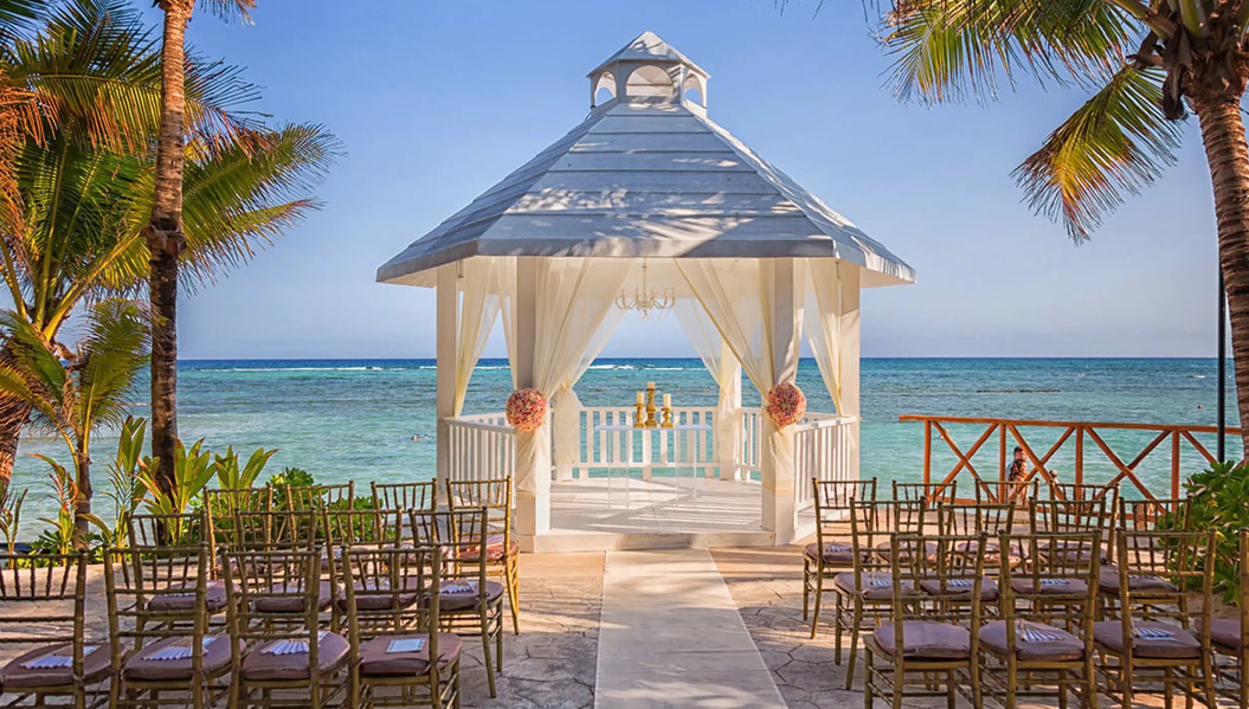 El dorado seaside suites white gazebo wedding venue setup
