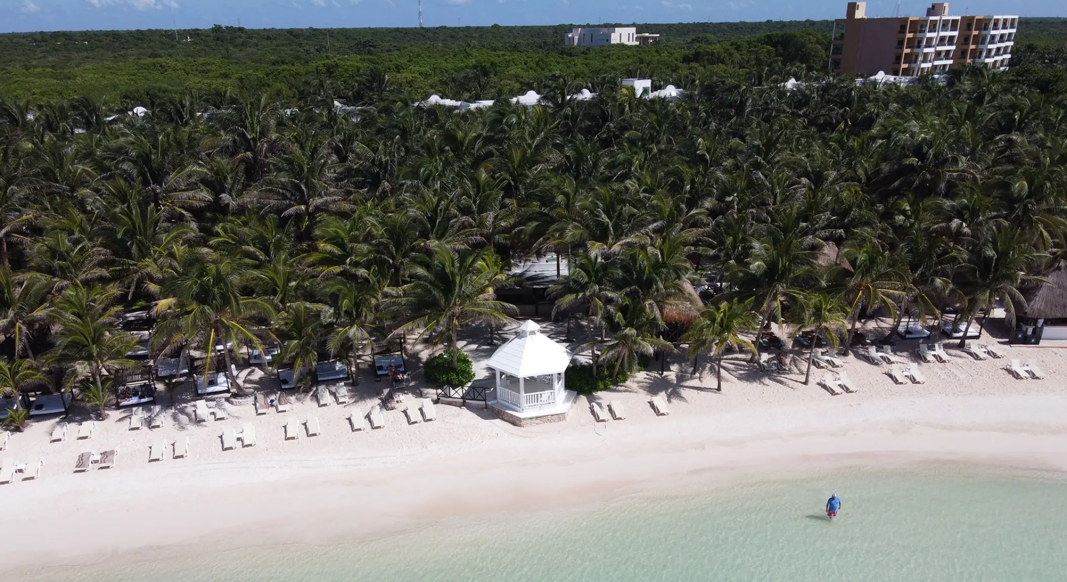 Aerial view of the white sand beach and gazebo at El Dorado Seaside Palms, Riviera Maya