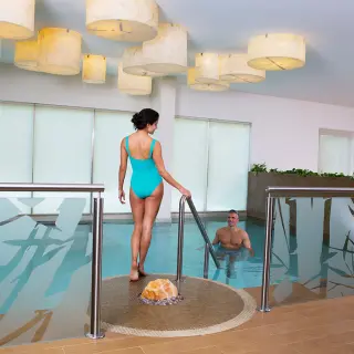 Indoor hydrotherapy pool area at El Dorado Seaside Suites, Riviera Maya