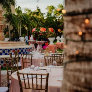 Mexican plaza wedding reception with tiled fountain at El Dorado Seaside Palms, Riviera Maya