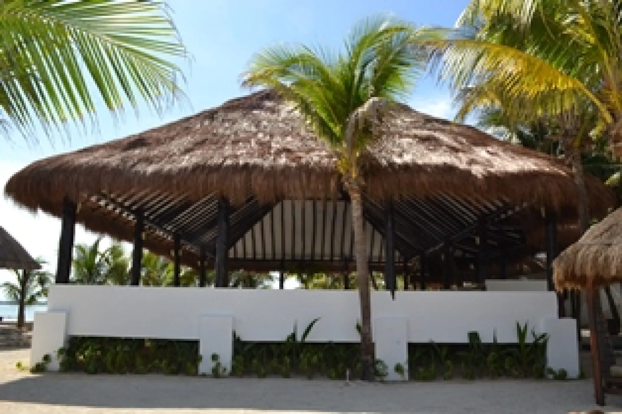 Thatched-roof palapa venue at El Dorado Seaside Palms, Riviera Maya