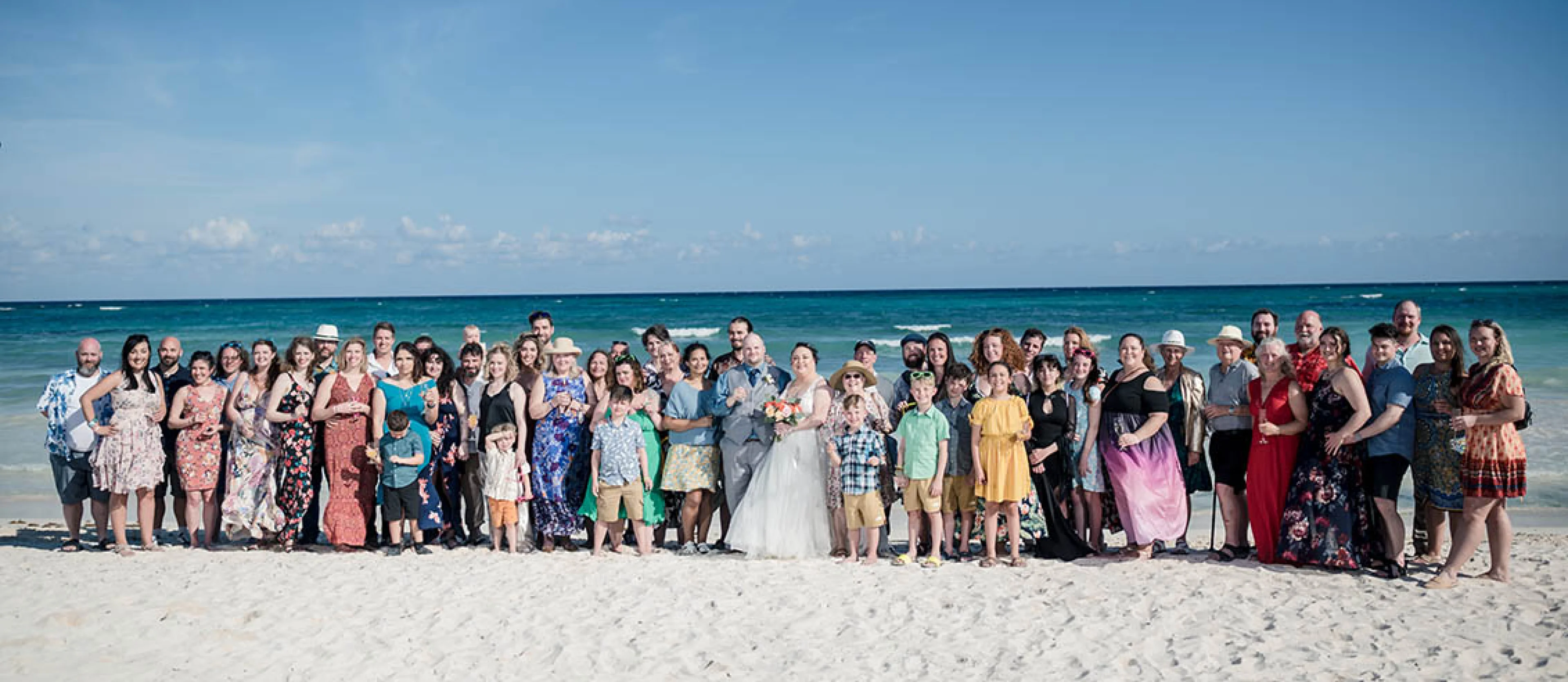 wedding group photo at the beach