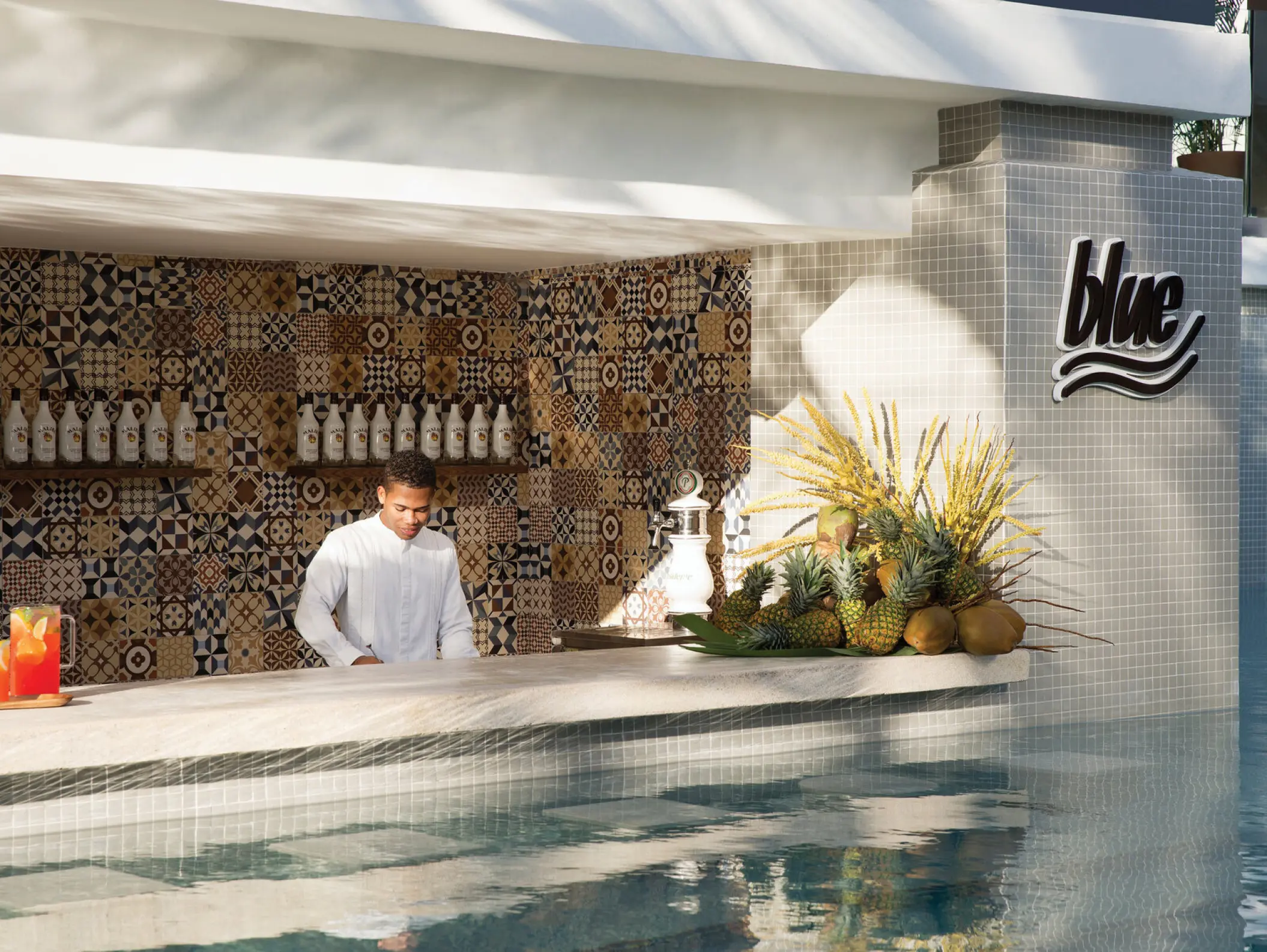 Bartender at Blue swim-up bar at Excellence El Carmen, Punta Cana