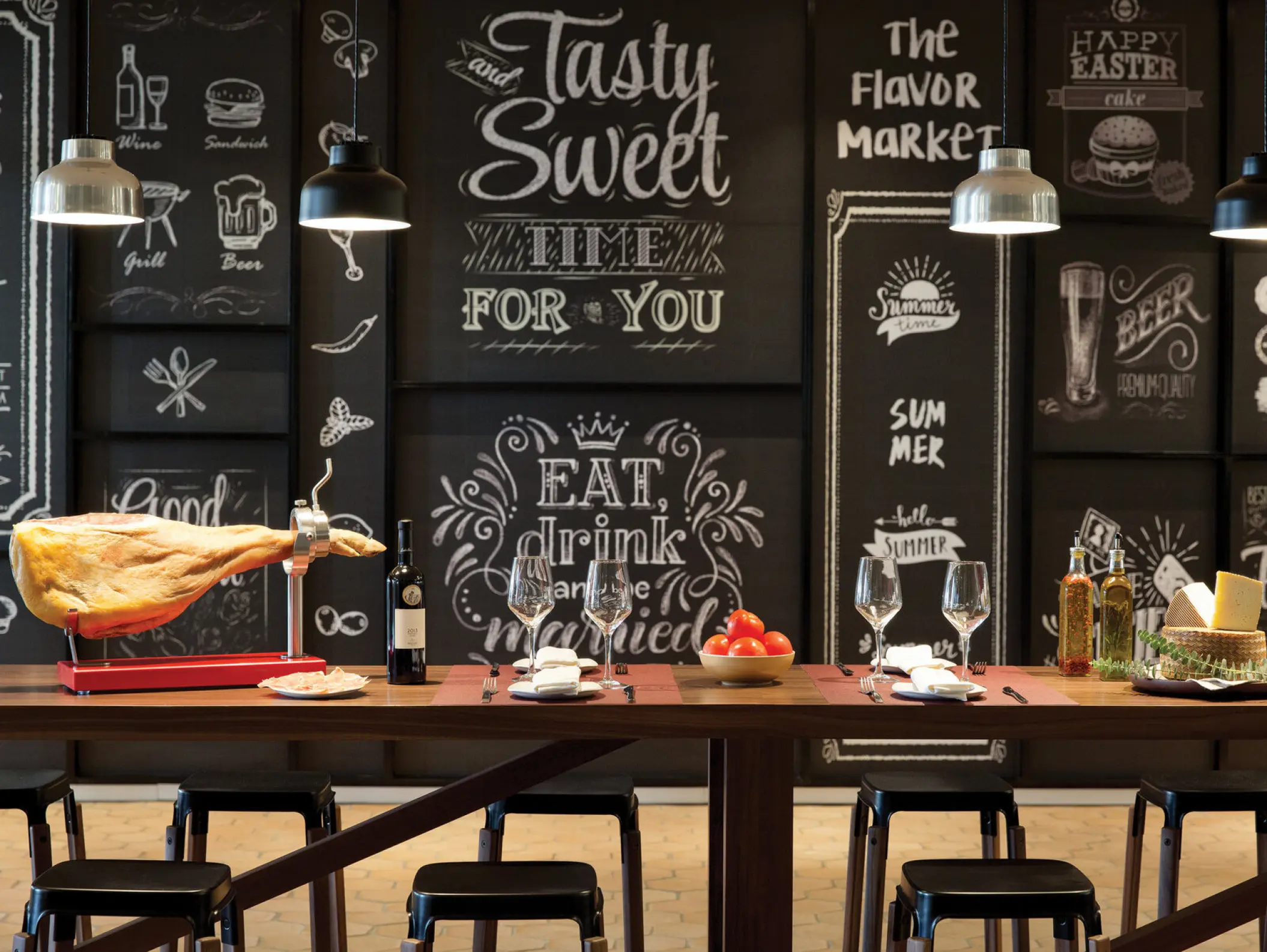 The Flavor Market tapas bar with chalk-art walls at Excellence El Carmen, Punta Cana
