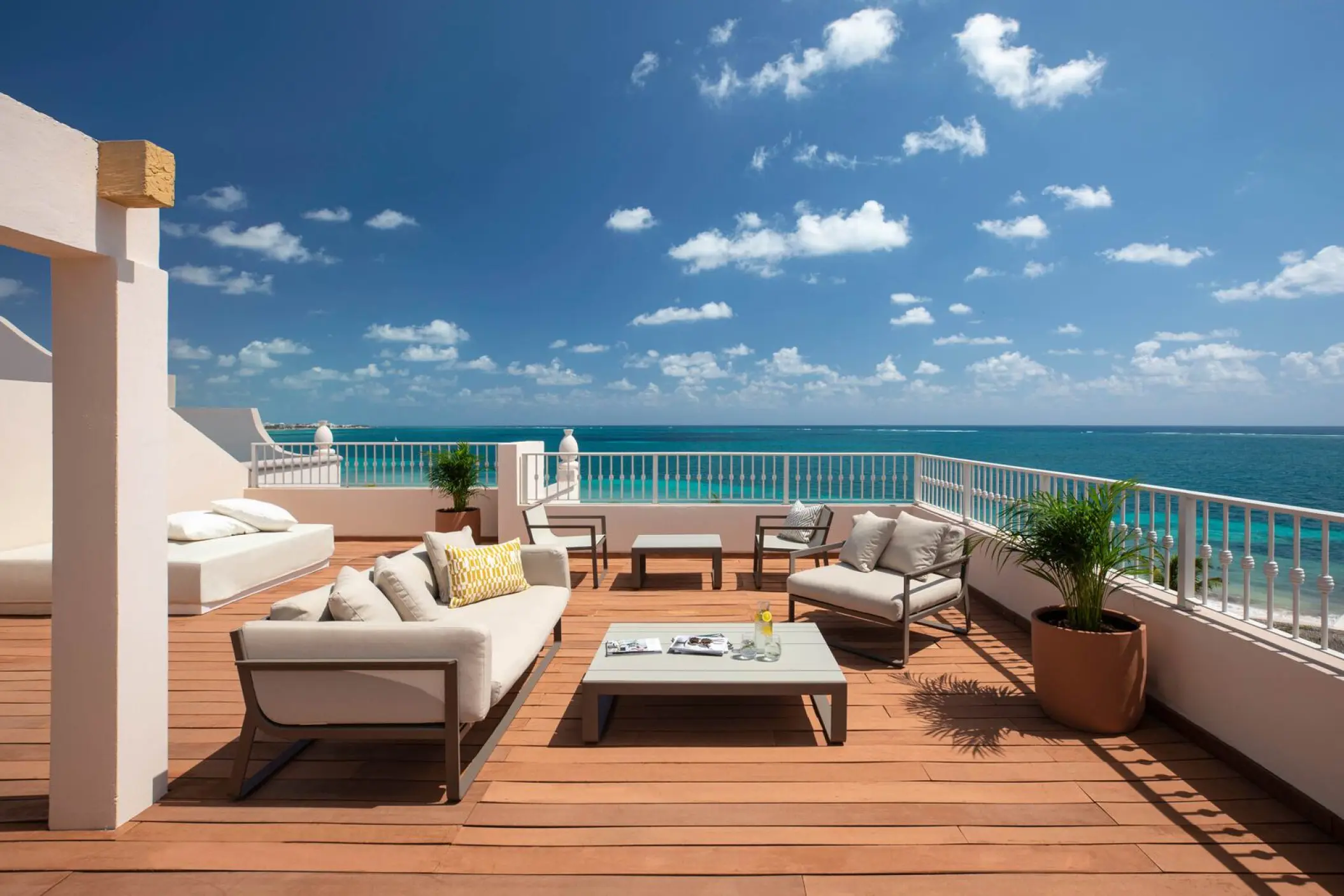 Excellence Riviera Cancun honeymoon suite terrace with outdoor seating overlooking the ocean, Riviera Maya