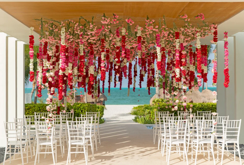 Finest Playa Mujeres gazebo wedding venue facing beach with flowers