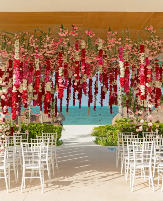 Finest Playa Mujeres gazebo wedding venue facing beach with flowers