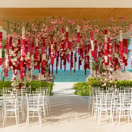 Finest Playa Mujeres gazebo wedding venue facing beach with flowers