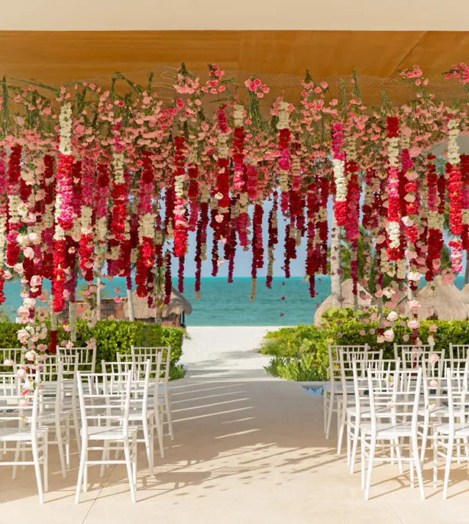 Hanging floral installation for a wedding ceremony at Finest Playa Mujeres, Cancun