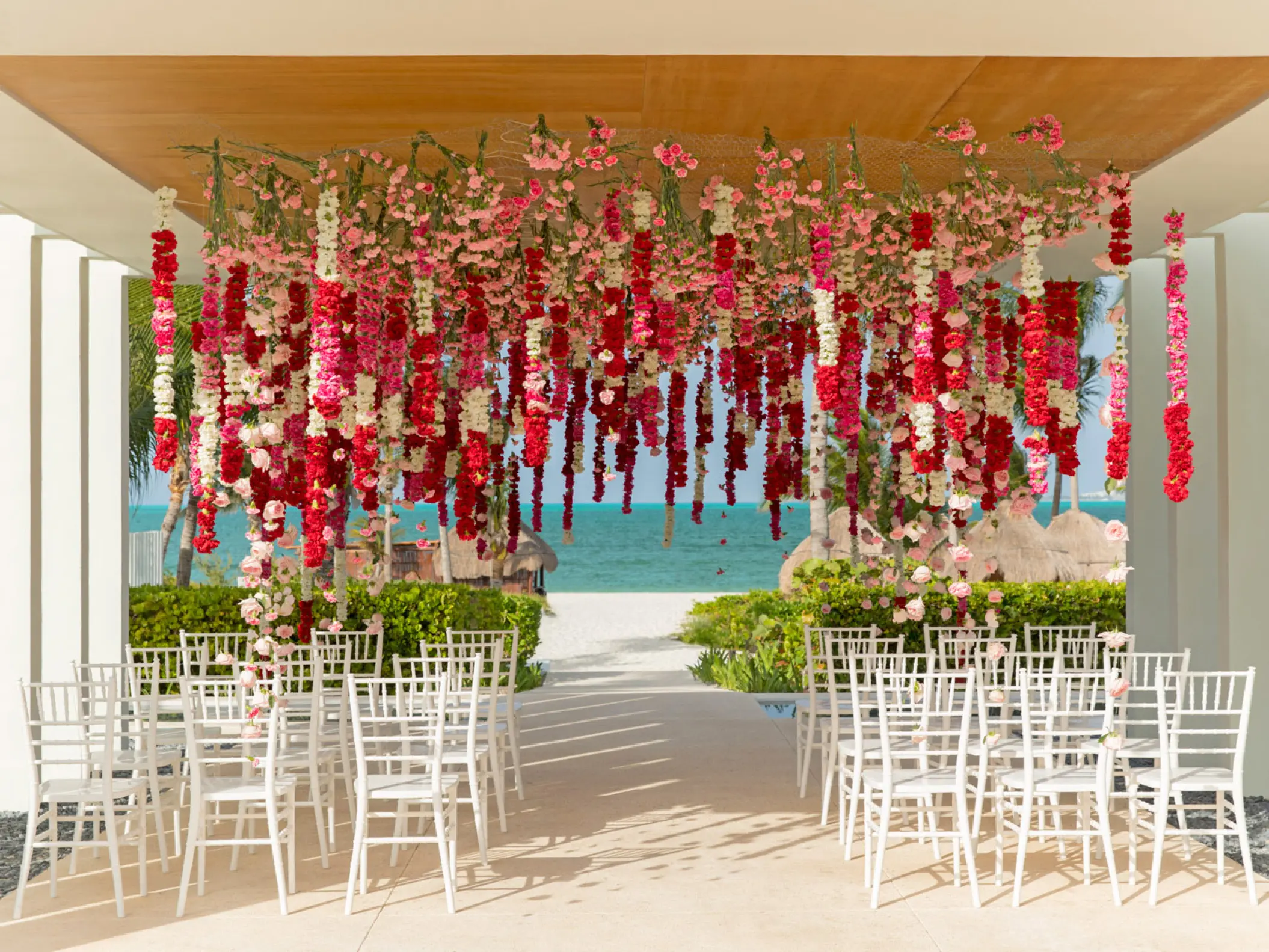 Hanging floral installation for a wedding ceremony at Finest Playa Mujeres, Cancun