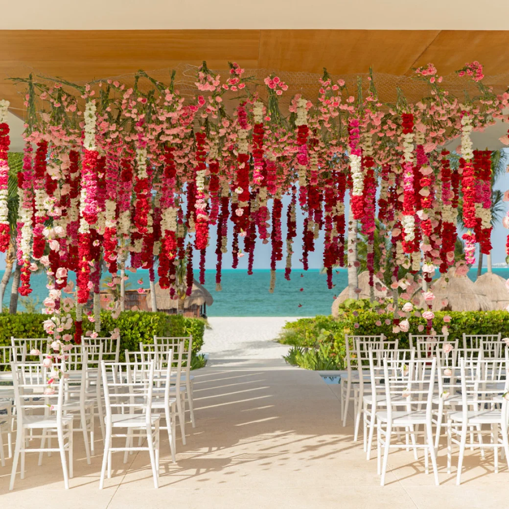 Finest Playa Mujeres gazebo wedding venue facing beach with flowers