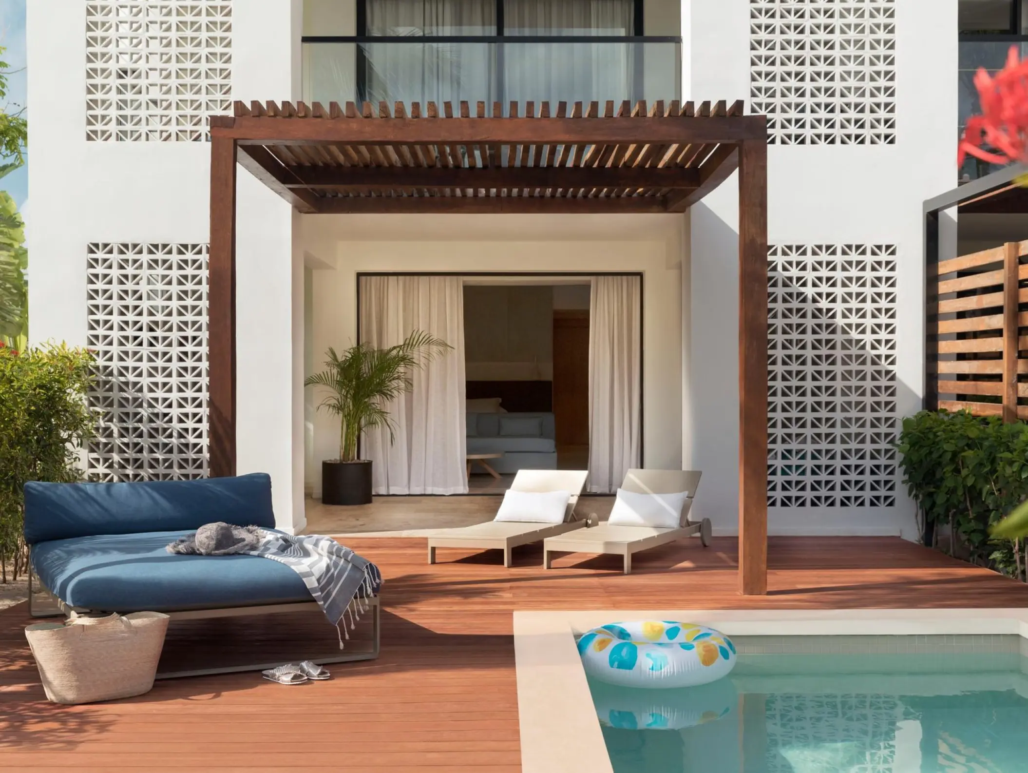Finest Playa Mujeres junior suite terrace with a private pool and wooden pergola, Cancun