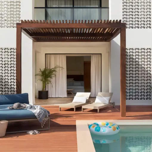 Finest Playa Mujeres junior suite terrace with a private pool and wooden pergola, Cancun