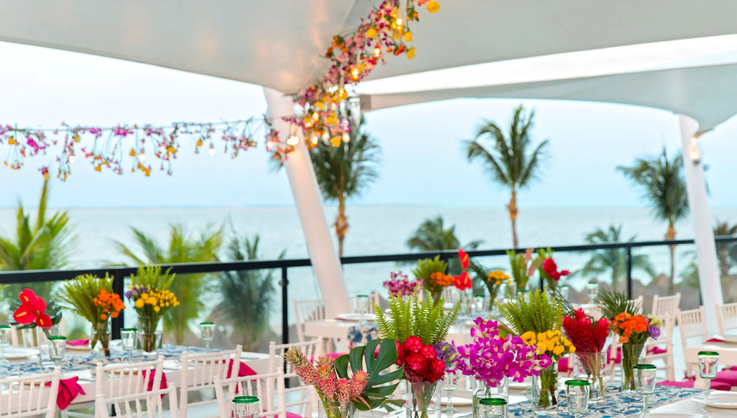 Outdoor wedding reception setup with ocean views at Finest Playa Mujeres, Cancun