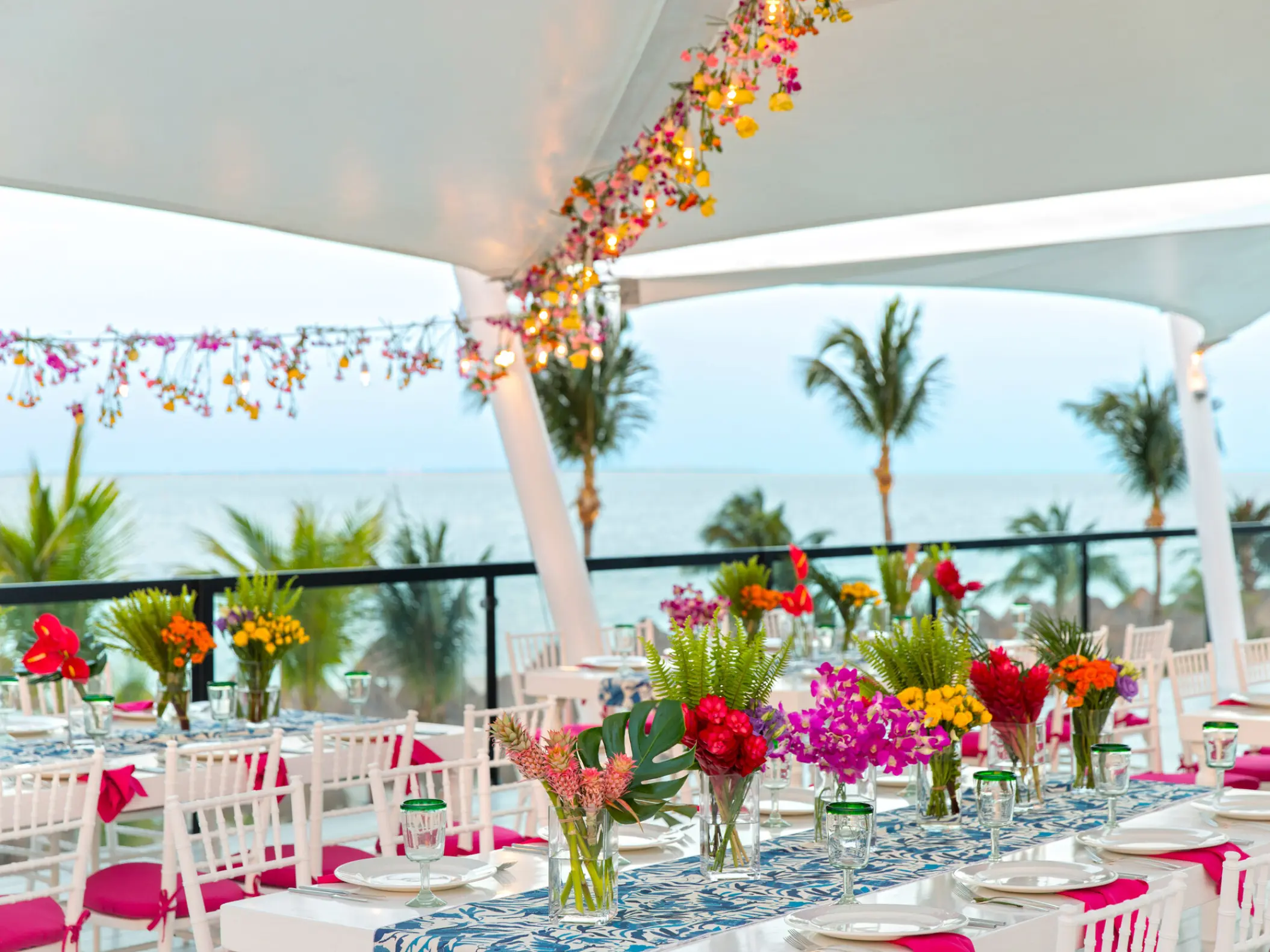 Outdoor wedding reception setup with ocean views at Finest Playa Mujeres, Cancun