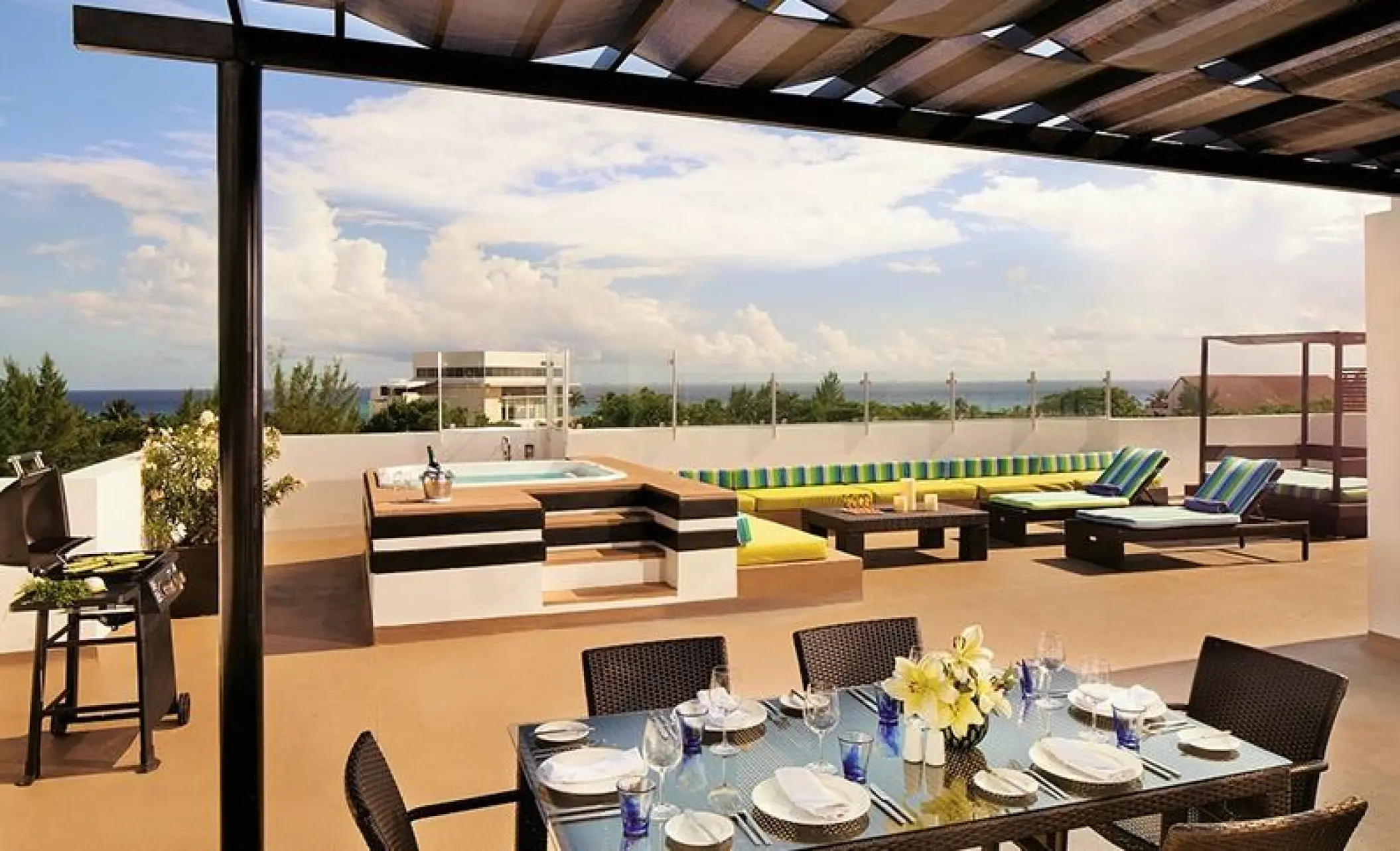Penthouse terrace with a private pool, dining area, and grill at The Fives Beach Hotel, Playa Del Carmen