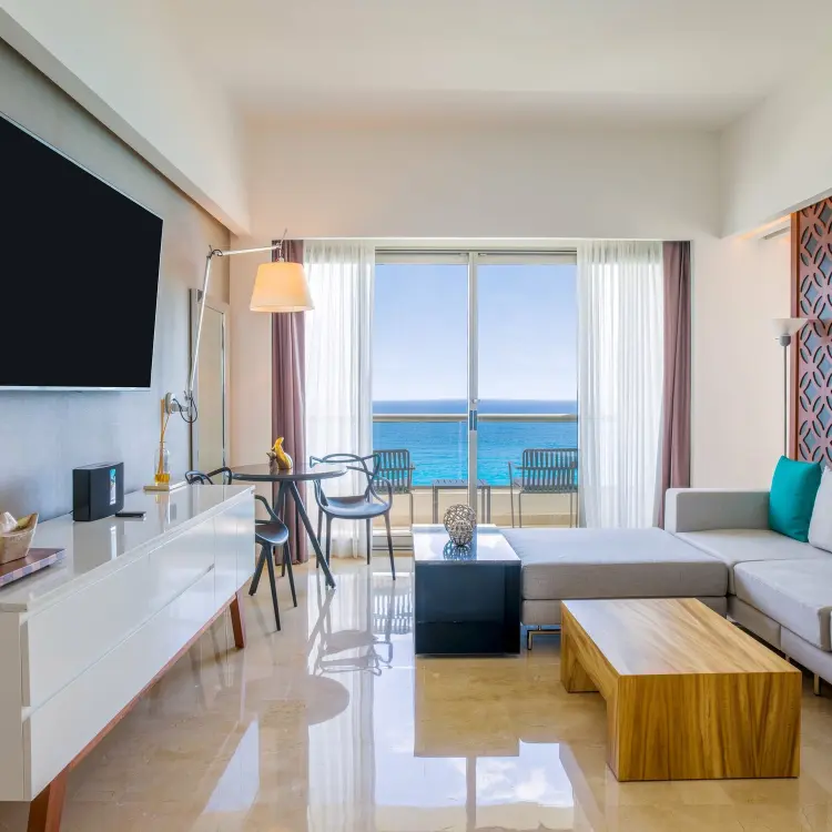 Fuego Suite living area with ocean view at Live Aqua Beach Resort, Cancun