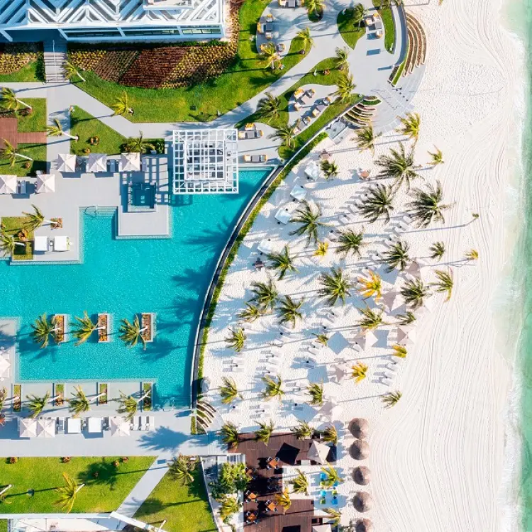 Aerial view of Garza Blanca Cancun pools and white sand beach, Cancun