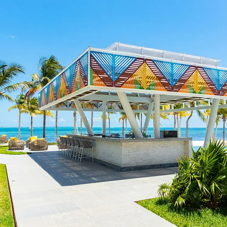 Colorful outdoor beach bar at Garza Blanca Cancun