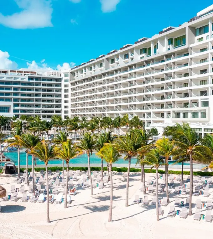 Garza Blanca Cancun modern exterior and beachfront palm trees, Cancun