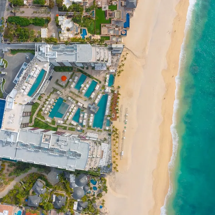 Aerial view of Garza Blanca Los Cabos pools and beachfront, Cabo San Lucas