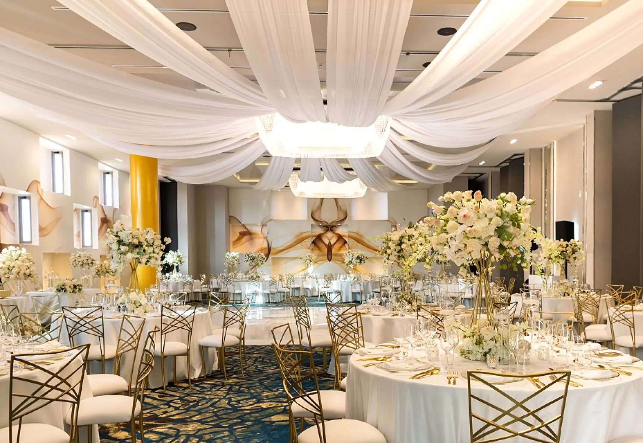 Indoor ballroom wedding reception at Garza Blanca Los Cabos, Cabo San Lucas