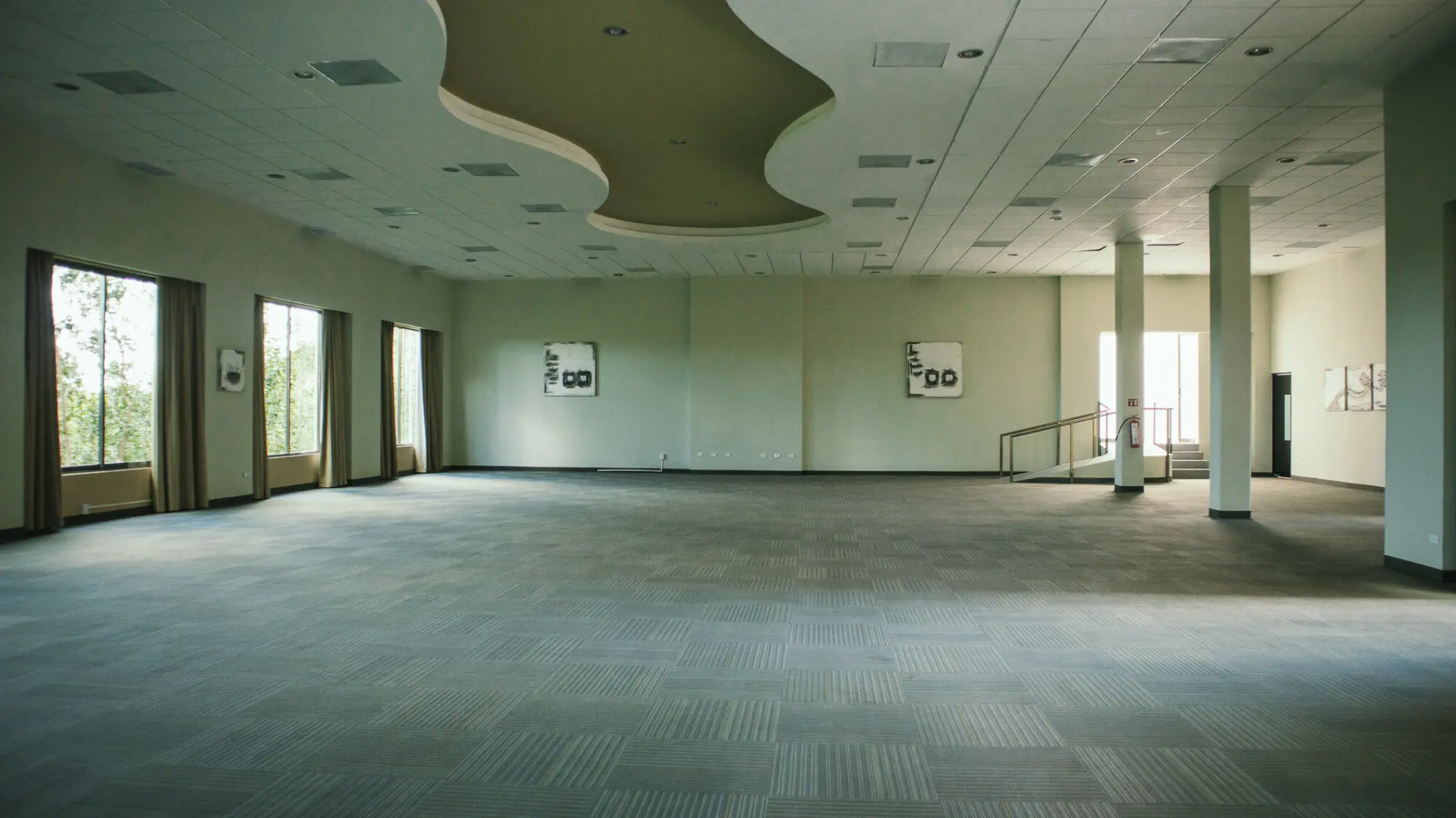 Spacious indoor ballroom with large windows and a modern ceiling design at Generations Riviera Maya, Riviera Maya