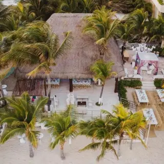 Aerial view of a wedding reception setup at the Palapa Ganesha, Generations Riviera Maya