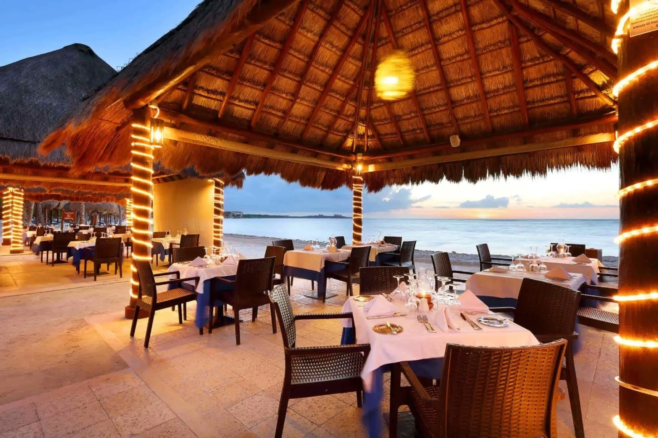 Open-air palapa beachfront restaurant at Grand Palladium Colonial, Riviera Maya
