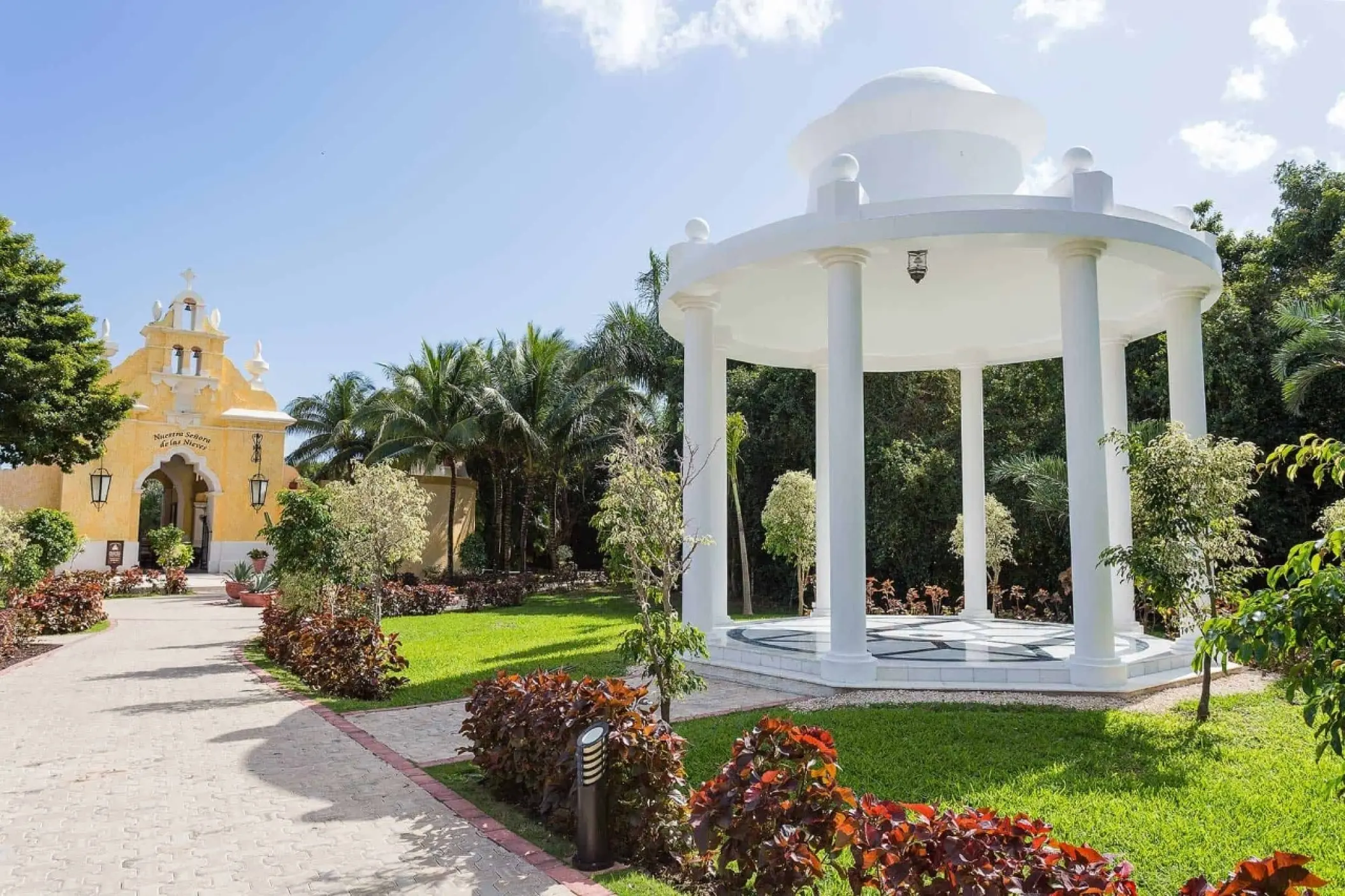 White garden gazebo wedding ceremony venue at Grand Palladium Colonial, Riviera Maya