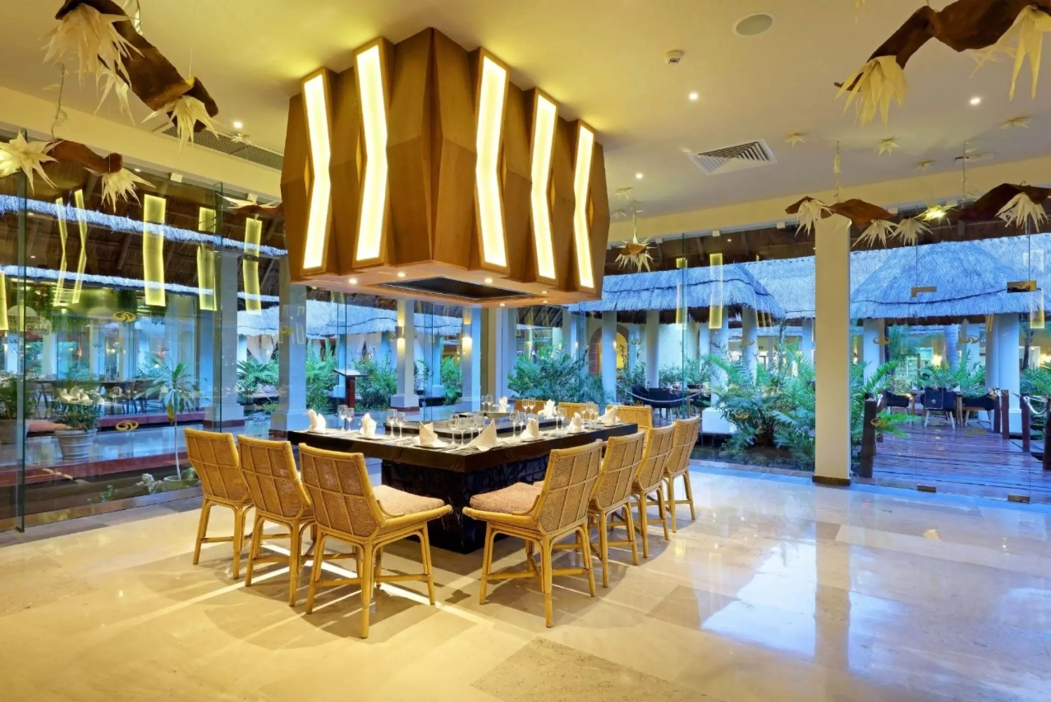 Japanese restaurant with teppanyaki grill and wicker seating at Grand Palladium Colonial, Riviera Maya