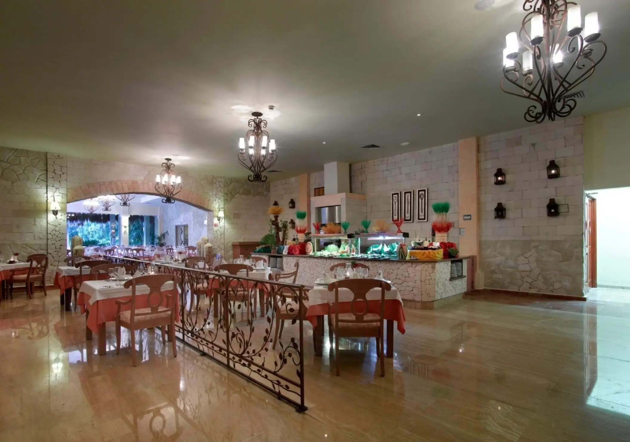 Portofino restaurant dining area with chandeliers at Grand Palladium Colonial, Riviera Maya