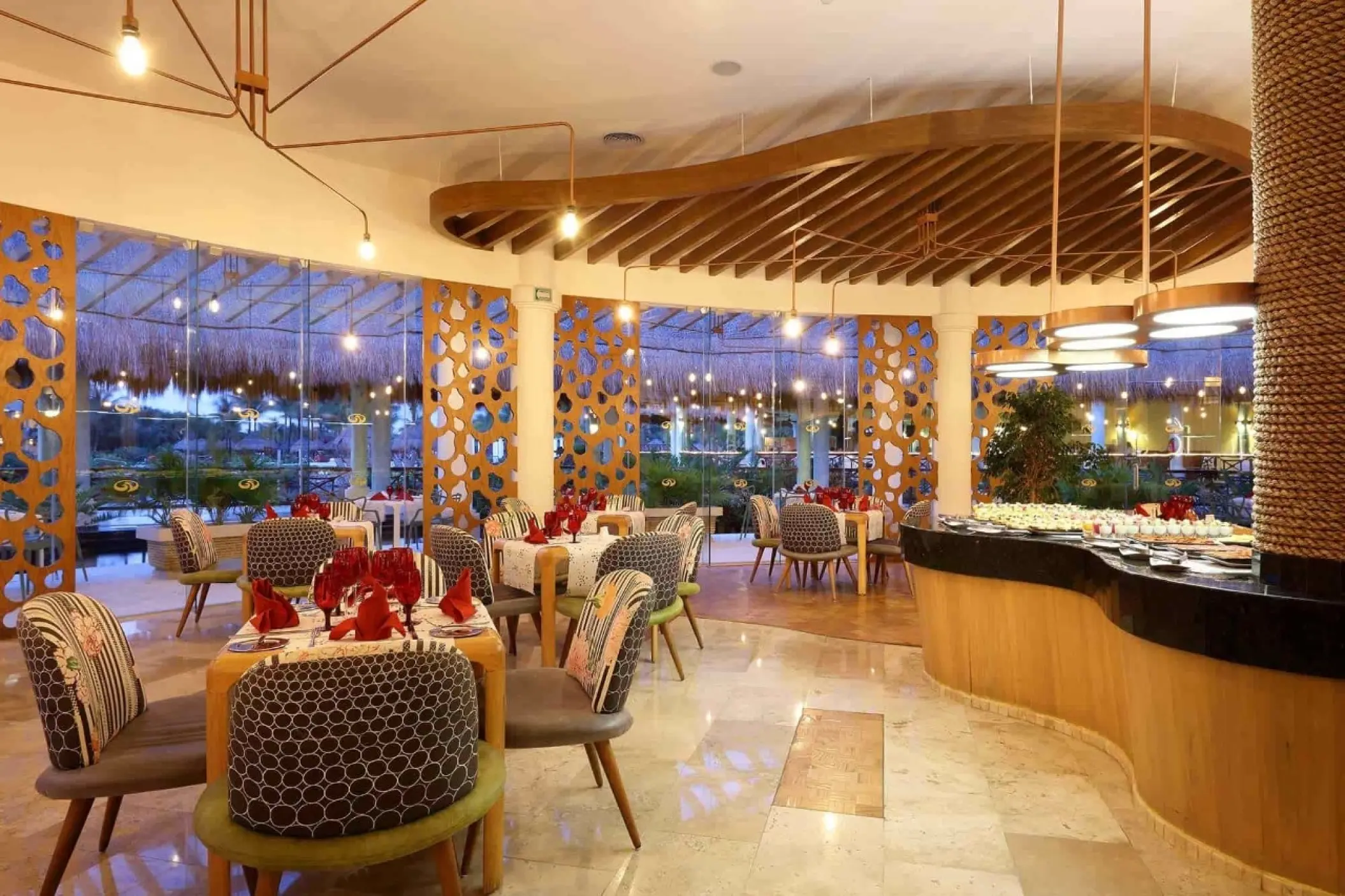 Buffet station and indoor dining area at Grand Palladium Colonial, Riviera Maya