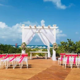 Ceremony decor on the beach deck at Grand Palladium Costa Mujeres