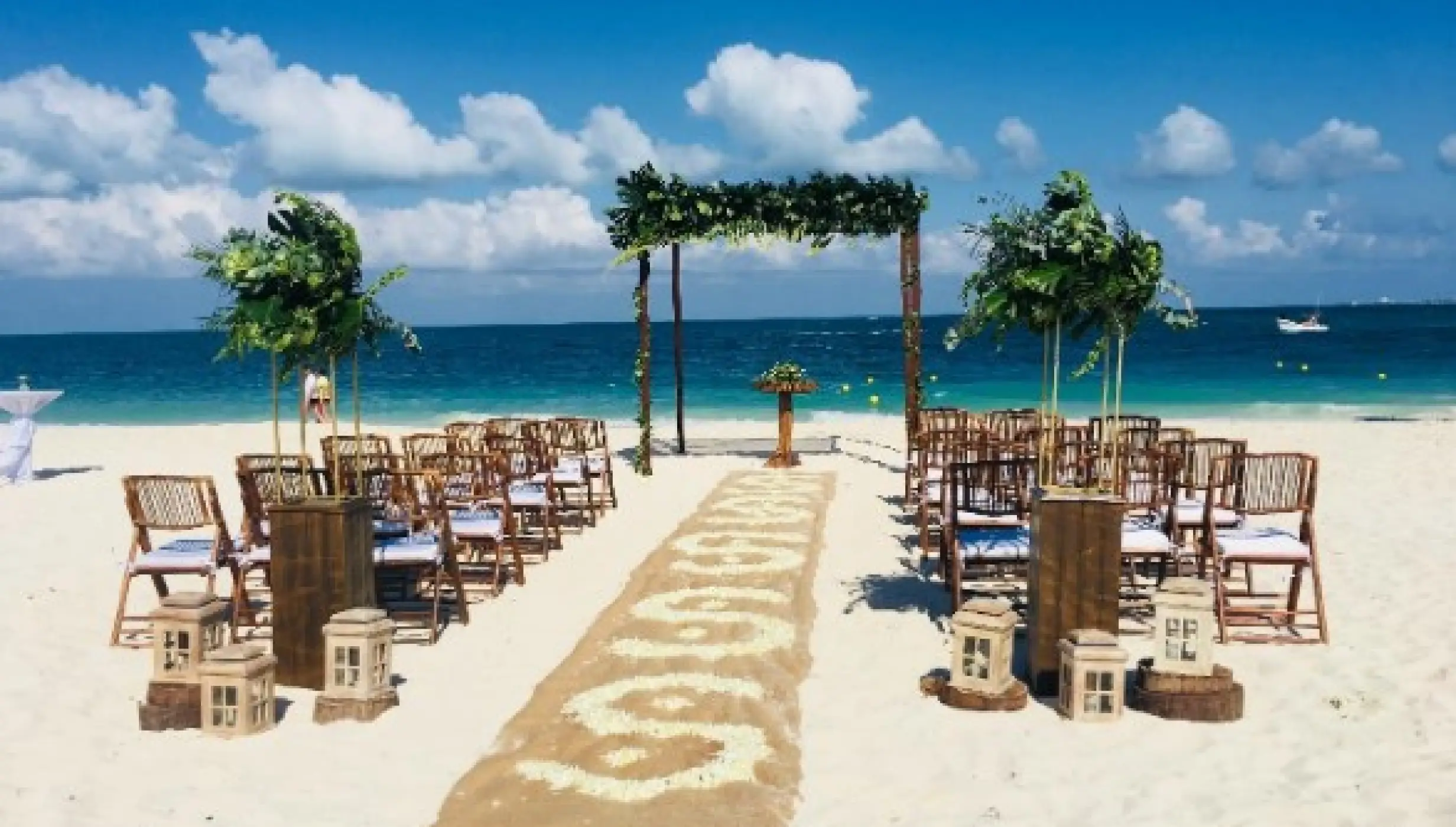 Ceremony decor on the beach at Grand Palladium Costa Mujeres