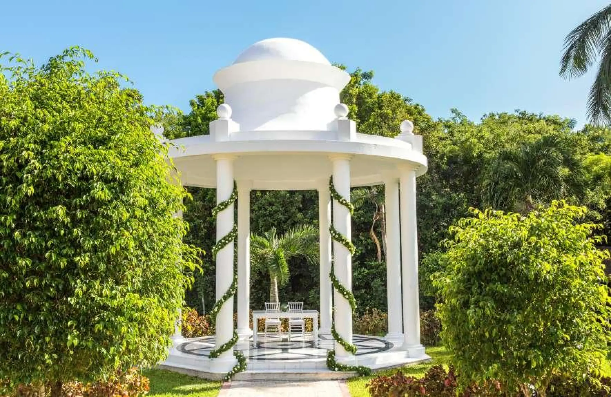 White garden gazebo wedding ceremony venue at Grand Palladium Colonial, Riviera Maya